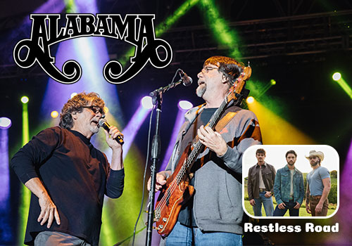 ALABAMA playing in a concert at night