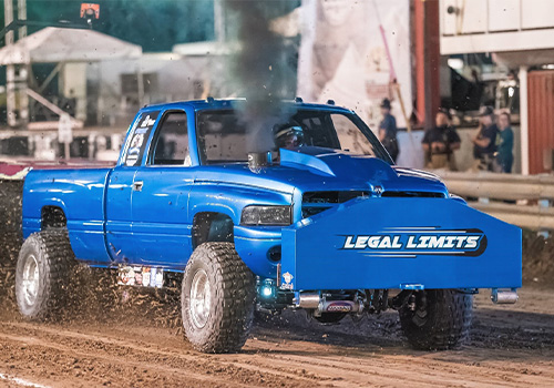 A blue truck in the Pro Pulling League